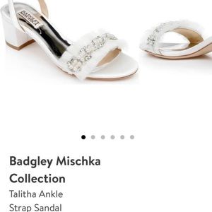 Like new. Wore for 4 hours on wedding day.